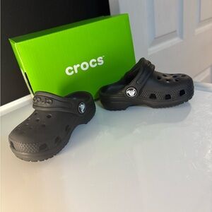 CROCS Kids Black slip on shoes